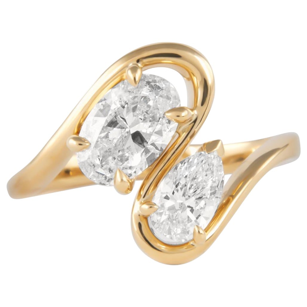 1.48ct Diamond Toi Et Moi Ring 18k Yellow Gold: 1.48ct Diamond Toi Et Moi Ring 18k Yellow Gold This exquisite Toi Et Moi ring features a stunning combination of a pear-shaped diamond and an oval-shaped diamond, totaling 1.48 carats. Crafted from 18