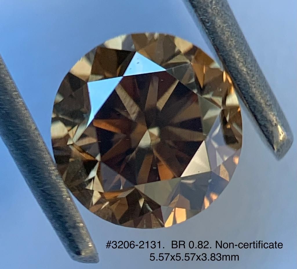 Loose Diamond - ROUND 0.82ct Brown VS1: Loose Diamond - ROUND 0.82ct Brown VS1 Source: Natural Shape: ROUND Carats: 0.82 Color: Brown Certification: NONE Video: