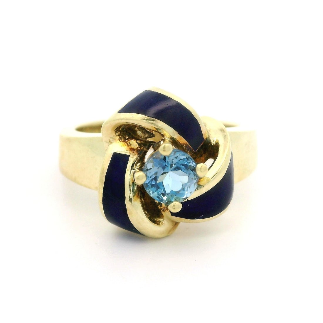 Vintage 14k Yellow Gold 0.56ct Aquamarine Blue Enamel Infinity Knot Ring: Vintage 14k Yellow Gold 0.56ct Aquamarine Blue Enamel Infinity Knot Ring This stunning vintage cocktail ring features a beautifully crafted infinity knot design in 14k yellow gold, accentuated by a vi
