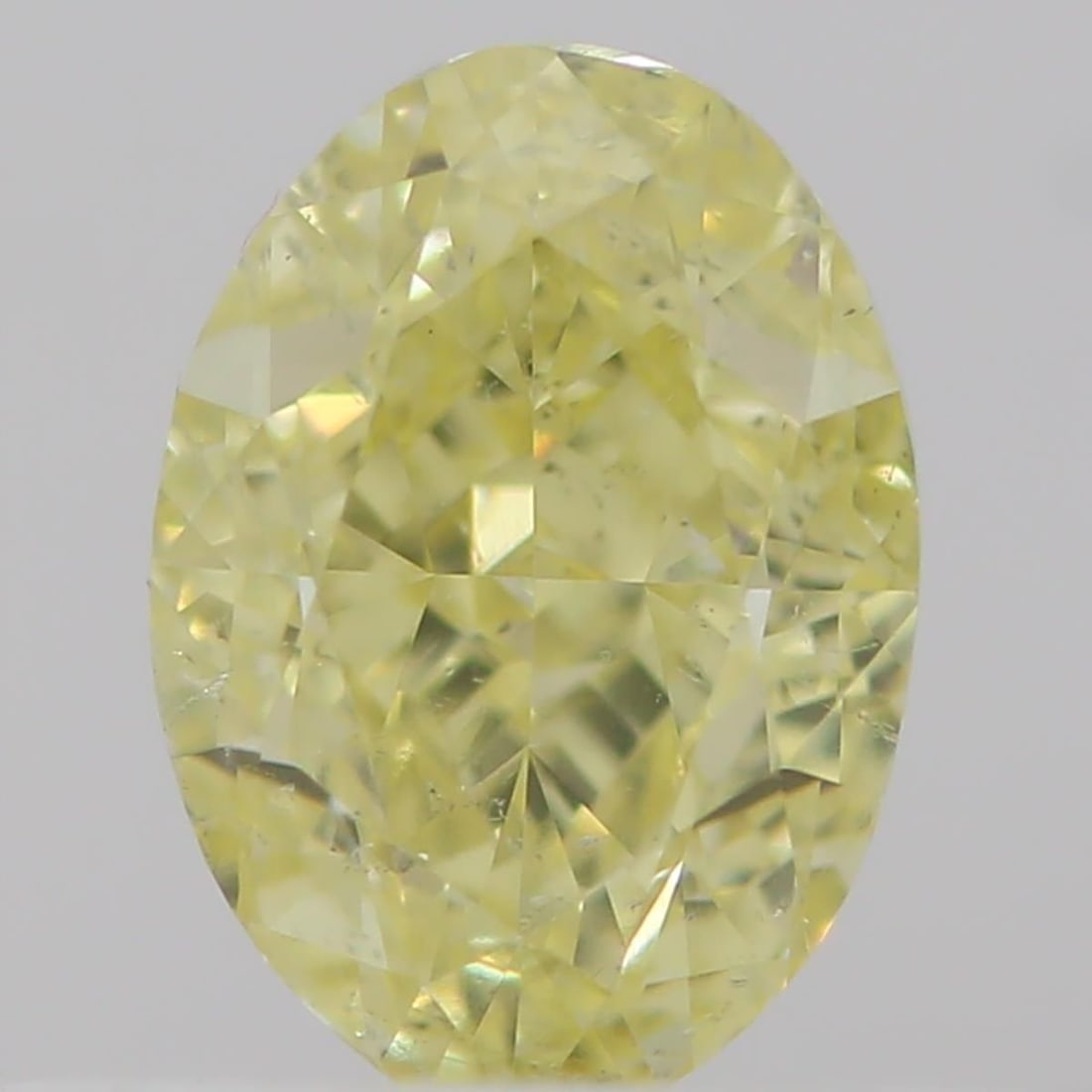 Loose Diamond - OVAL 0.5ct Fancy Yellow SI2: Loose Diamond - OVAL 0.5ct Fancy Yellow SI2 Source: Natural Shape: OVAL Carats: 0.5 Color: Fancy Yellow Certification: GIA Video: