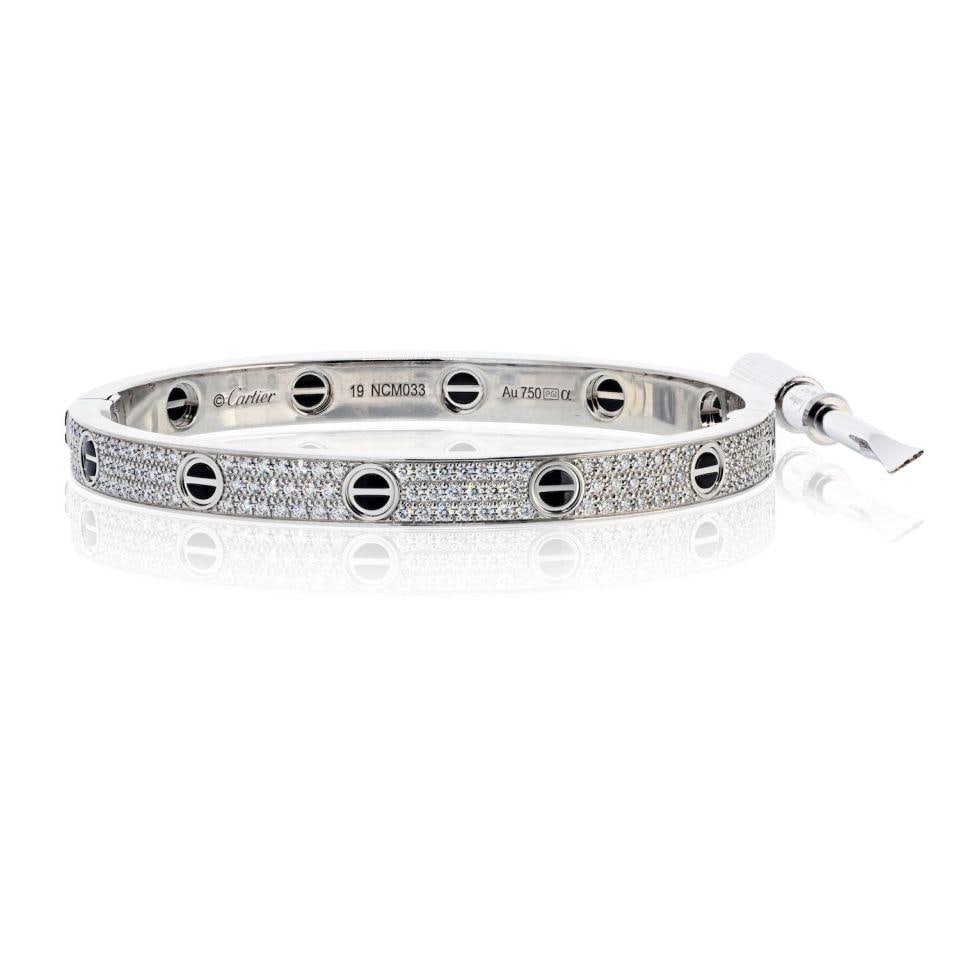 Cartier Love 18K White Gold Bracelet with Pave Diamonds and Ceramic Size 19: Cartier Love 18K White Gold Bracelet with Pave Diamonds and Ceramic Size 19 This authentic pre-owned Cartier Love bracelet is crafted from 18K white gold and features a stunning combination of