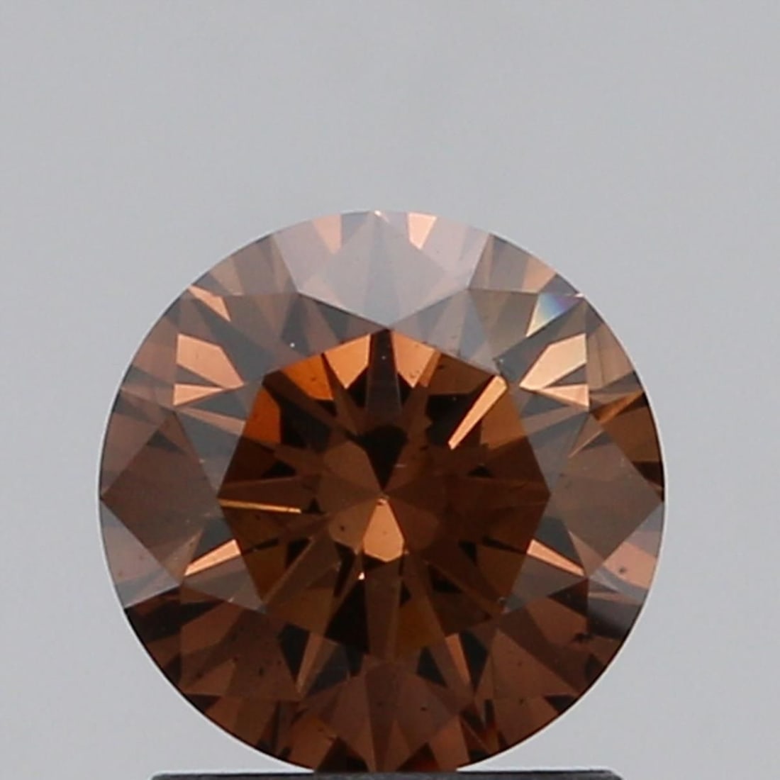 Loose Diamond - ROUND 1.18ct Orangey Brown VS2: Loose Diamond - ROUND 1.18ct Orangey Brown VS2 Source: Natural Shape: ROUND Carats: 1.18 Color: Orangey Brown Certification: NONE Video: