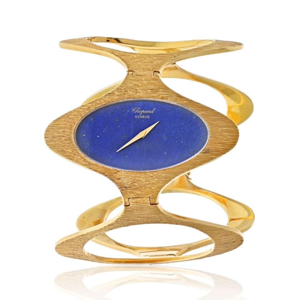 Chopard 1970s 18K White Gold Lapis Dial Bark Finish Wrist Watch: Chopard 1970s 18K White Gold Lapis Dial Bark Finish Wrist Watch Discover the elegance of this vintage Chopard wrist watch, crafted in 18K white gold with a unique bark finish. This 1970's gem features