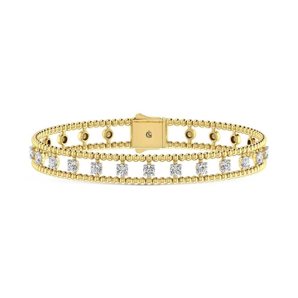 14K Yellow Gold Lab Grown Yellow and White Diamond 1 1/3 Ct.Tw Flexi Bangle: 14K Yellow Gold Lab Grown Yellow and White Diamond 1 1/3 Ct.Tw Flexi Bangle This 14K Yellow Gold flexi bangle features lab grown yellow and white diamonds totaling 1 1/3 Ct.Tw., offering luminous two-
