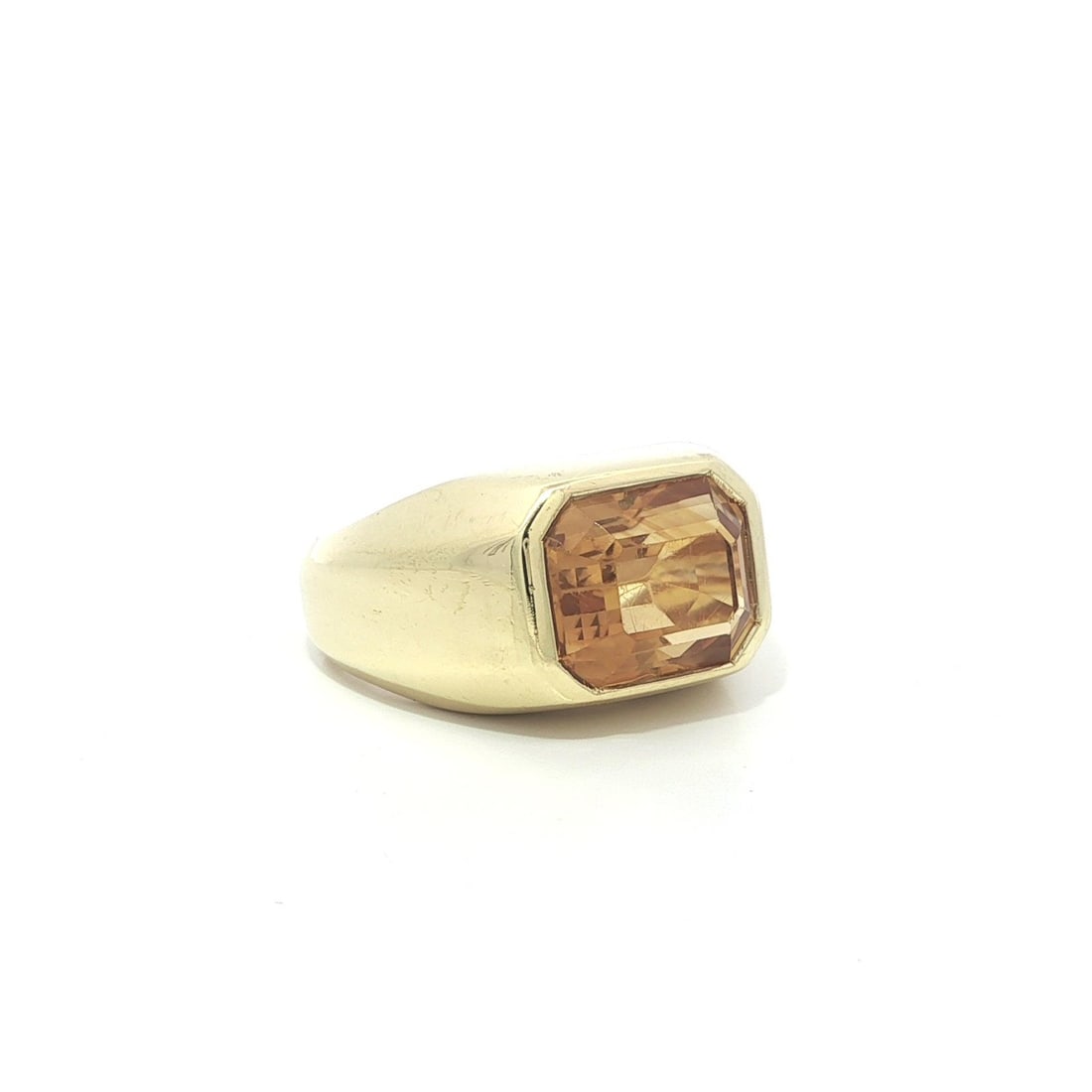 18k Yellow Gold 3.80ct Emerald Cut Citrine East West Band Ring: 18k Yellow Gold 3.80ct Emerald Cut Citrine East West Band Ring This exquisite East West solitaire band ring features a stunning 3.80ct natural citrine in an emerald cut, bezel set within solid 18k yel