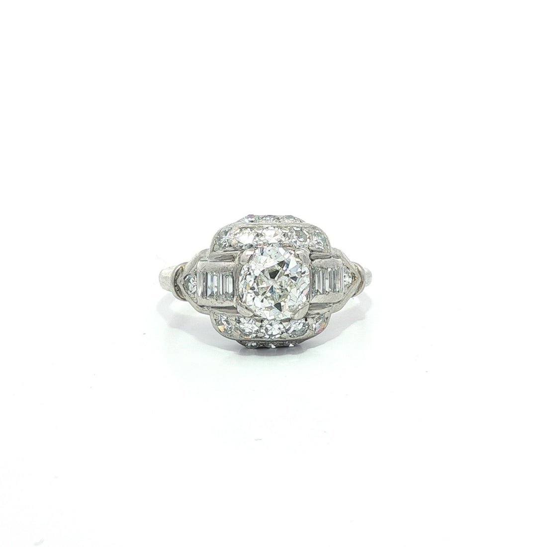 Antique Edwardian Platinum GIA 1.56ctw Old Mine Cut Diamond Ring: Antique Edwardian Platinum GIA 1.56ctw Old Mine Cut Diamond Ring This stunning Antique Edwardian engagement ring features a magnificent 1.00ct old mine cut diamond at its center, certified by GIA with