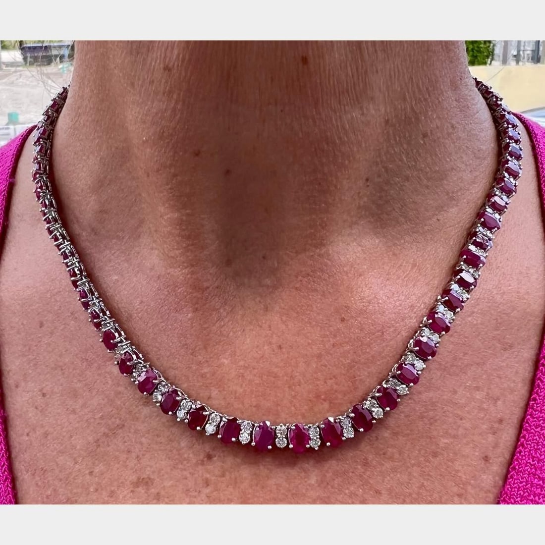 Elegant 14K White Gold Ruby Diamond Necklace 38 Ct Rubies 6.25 Ct Diamonds: Elegant 14K White Gold Ruby Diamond Necklace 38 Ct Rubies 6.25 Ct Diamonds This stunning 14K white gold necklace features an exquisite arrangement of 64 rubies and 126 diamonds. The rubies collectivel