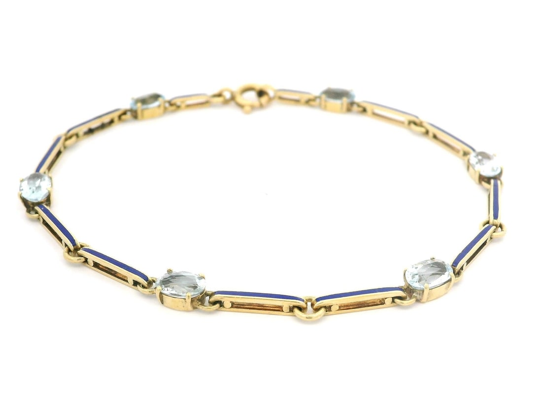 Vintage 17k Yellow Gold Aquamarine & Blue Enamel Bracelet 6.75in: Vintage 17k Yellow Gold Aquamarine & Blue Enamel Bracelet 6.75in This vintage bracelet showcases an exquisite design featuring alternating links of natural aquamarine and blue enamel. Crafted from