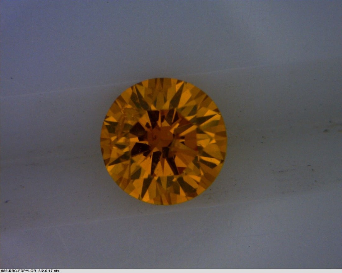 Loose Diamond - ROUND 0.17ct Fancy Deep Yellowish Orange: Loose Diamond - ROUND 0.17ct Fancy Deep Yellowish Orange Source: Natural Shape: ROUND Carats: 0.17 Color: Fancy Deep Yellowish Orange Certification: GIA PLEASE NOTE: Framed, Large, or heavy items
