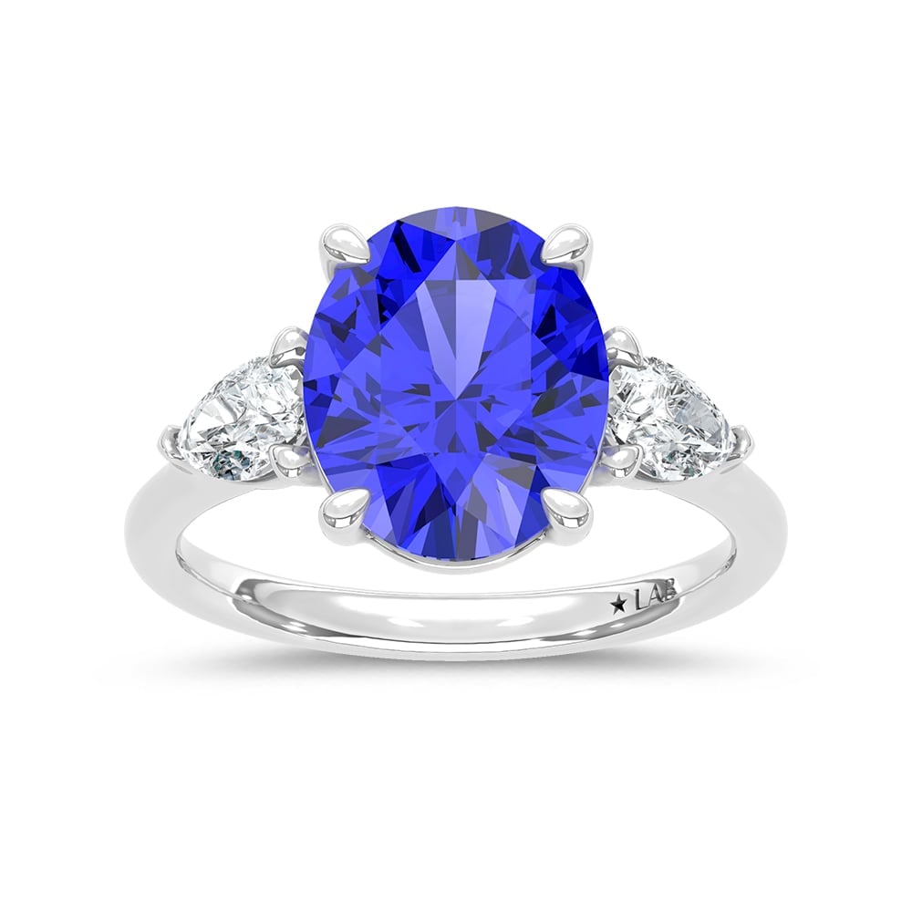 14K White Gold Lab Grown Diamond 5 5/8 Ct.Tw. Cushion Shape Recrystalized Blue Sapphire Engagement: 14K White Gold Lab Grown Diamond 5 5/8 Ct.Tw. Cushion Shape Recrystalized Blue Sapphire Engagement Ring (Center 5 ct) Elevate your elegance with this 14K white gold engagement ring, showcasing a stunn