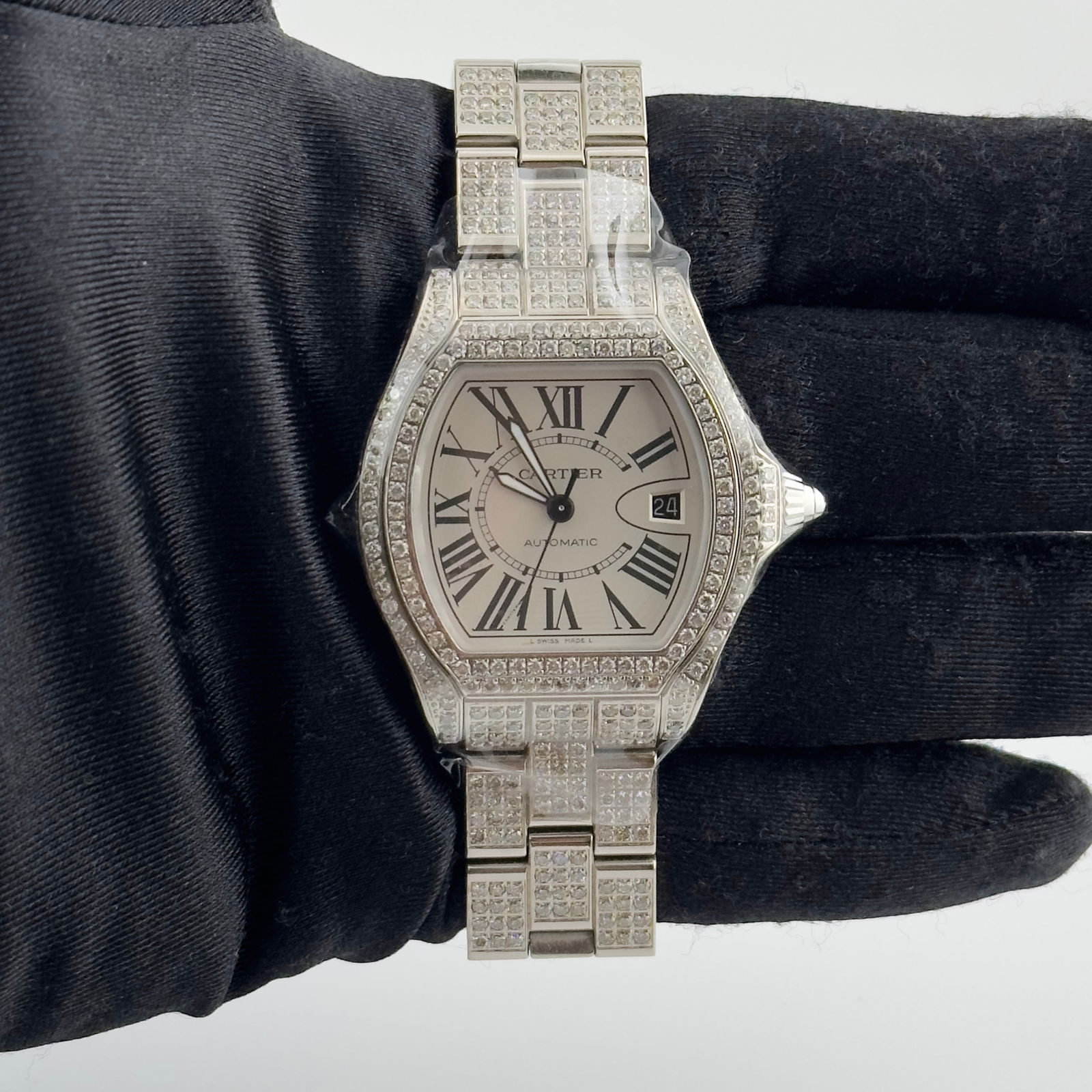 Cartier Roadster 3312 Mens Watch Silver Roman Diamond Bezel and Bracelet: Cartier Roadster 3312 Mens Watch Silver Roman Diamond Bezel and Bracelet This Cartier Roadster watch features a silver Roman numeral dial, a diamond bezel, and a diamond bracelet. Designed for men, it