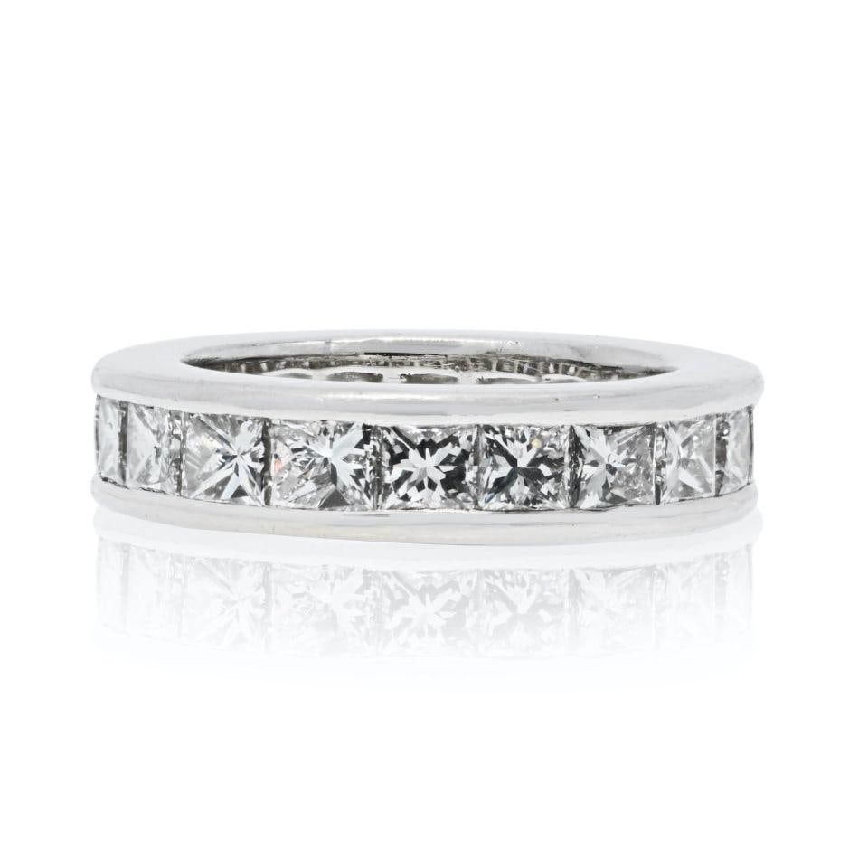 Cartier Platinum 5.50ct Princess Cut Diamond Eternity Ring EU 49: Cartier Platinum 5.50ct Princess Cut Diamond Eternity Ring EU 49 Discover the epitome of elegance with this exquisite estate wedding band from Cartier. Crafted in luxurious platinum, this ring feature