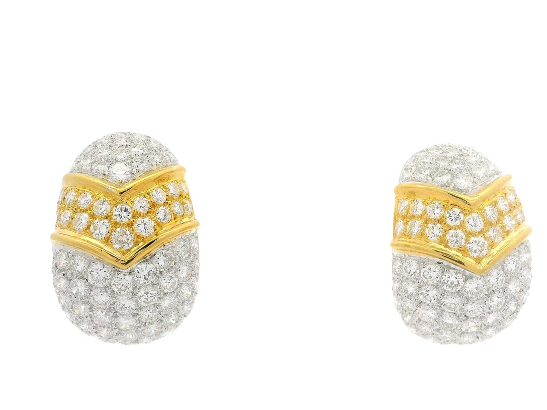 Stunning 18k Two Tone Gold 7.46ctw Diamond Cuff Earrings: Stunning 18k Two Tone Gold 7.46ctw Diamond Cuff Earrings Experience elegance with these stunning 18k Two Tone Gold Cuff Earrings, featuring a dazzling array of 178 natural genuine diamonds. Each round