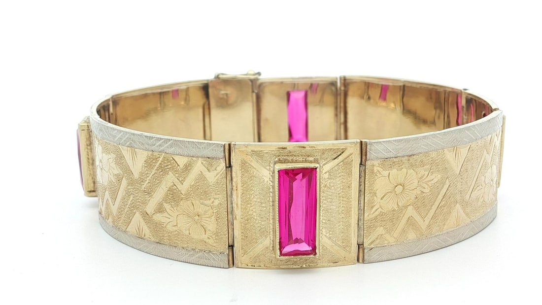 Vintage 14k Gold Hand Engraved Bracelet with Pink Synthetic Stones: Vintage 14k Gold Hand Engraved Bracelet with Pink Synthetic Stones This exquisite Vintage 14k Gold Bracelet features a stunning design with vivid pink synthetic stones. The bracelet showcases four lon