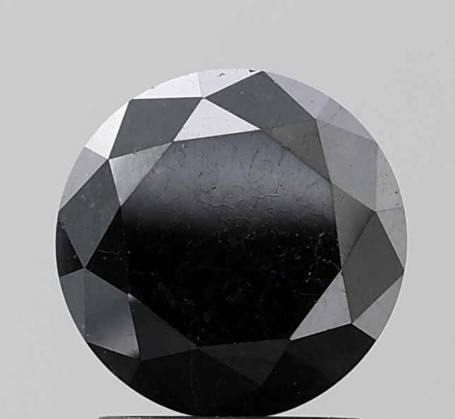 Loose Diamond - ROUND 2.28ct Fancy Black VS1: Loose Diamond - ROUND 2.28ct Fancy Black VS1 Source: Natural Shape: ROUND Carats: 2.28 Color: Fancy Black Certification: NONE Video: