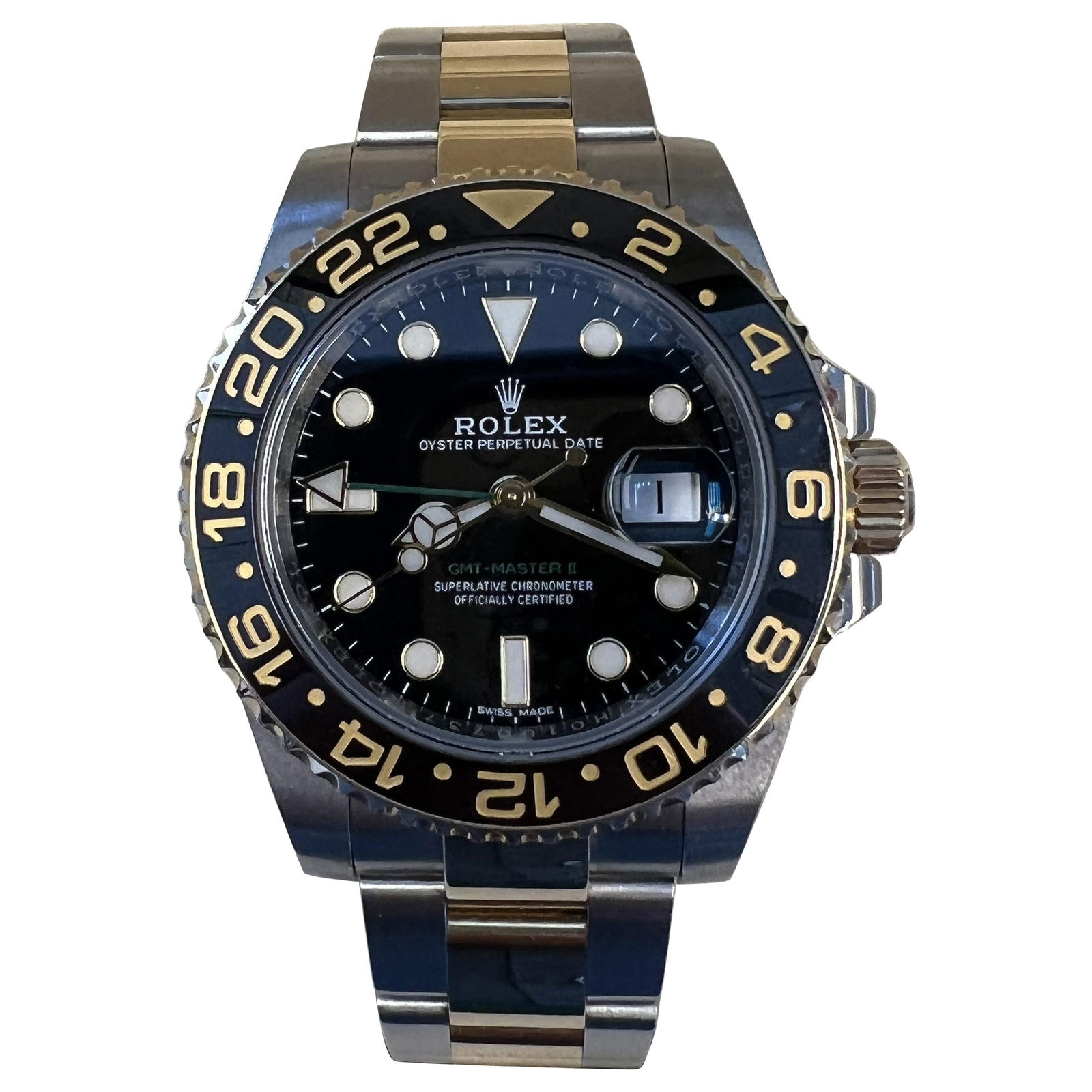 Rolex GMT Master II 116713 Two Tone 18k Gold Black Dial Automatic Watch: Rolex GMT Master II 116713 Two Tone 18k Gold Black Dial Automatic Watch Introducing the Rolex GMT-Master II, a stunning blend of luxury and functionality. This exquisite watch features an elegant roun