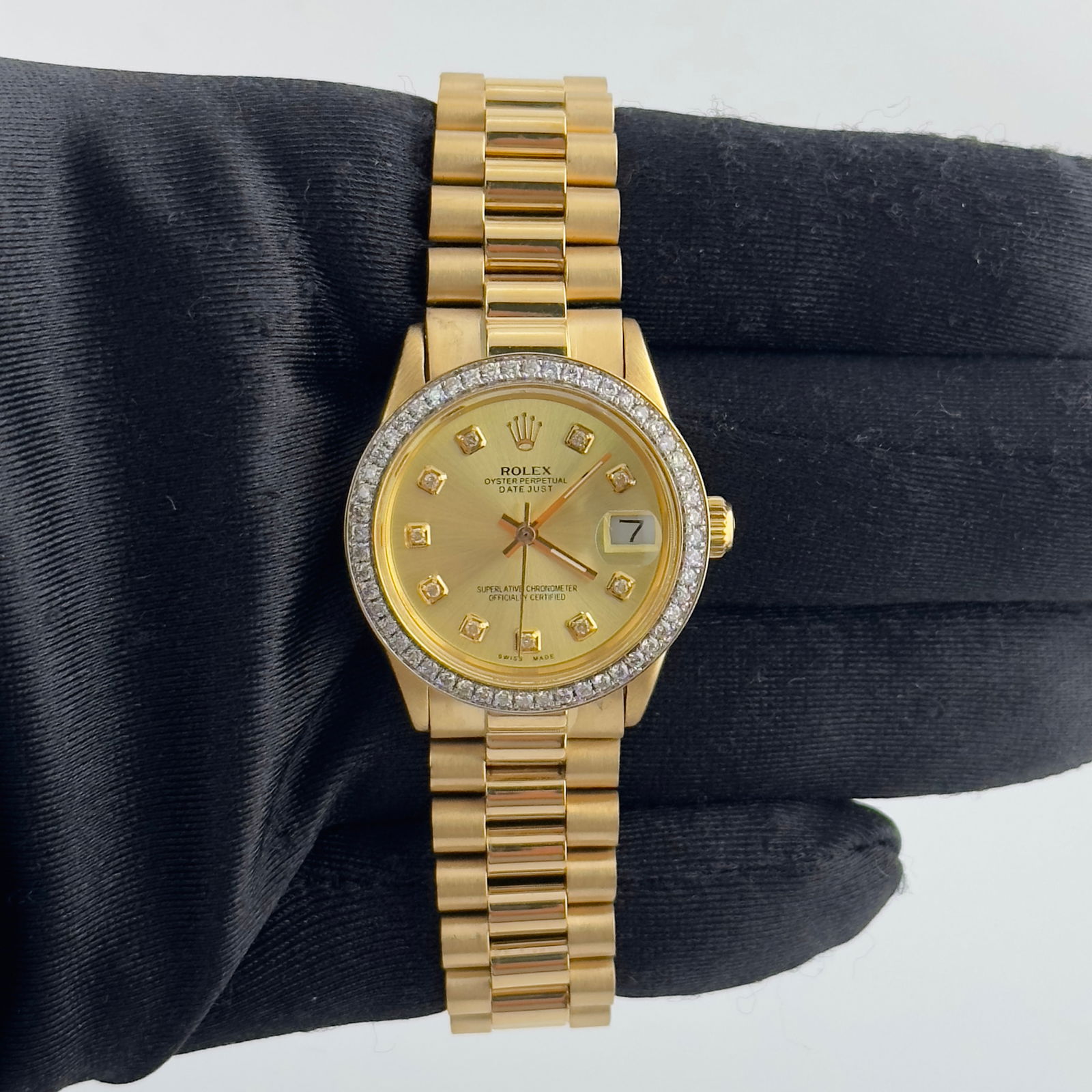 Ladies Rolex 6827 Datejust President Aftermarket Diamond Champagne Dial Watch: Ladies Rolex 6827 Datejust President Aftermarket Diamond Champagne Dial Watch This ladies Rolex Datejust President watch features an aftermarket champagne diamond dial, a pave 10k bezel, and an afterm