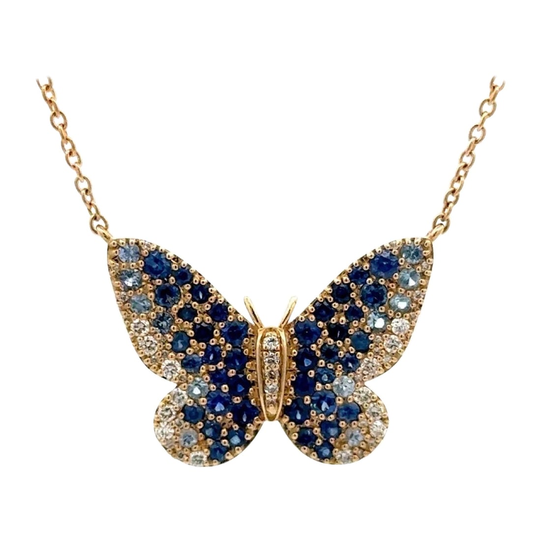 Butterfly Pendant Necklace in 14K Yellow Gold with Sapphire and Diamond Accents: Butterfly Pendant Necklace in 14K Yellow Gold with Sapphire and Diamond Accents This butterfly pendant necklace is crafted from 14K yellow gold and showcases a contemporary design. The pendant feature