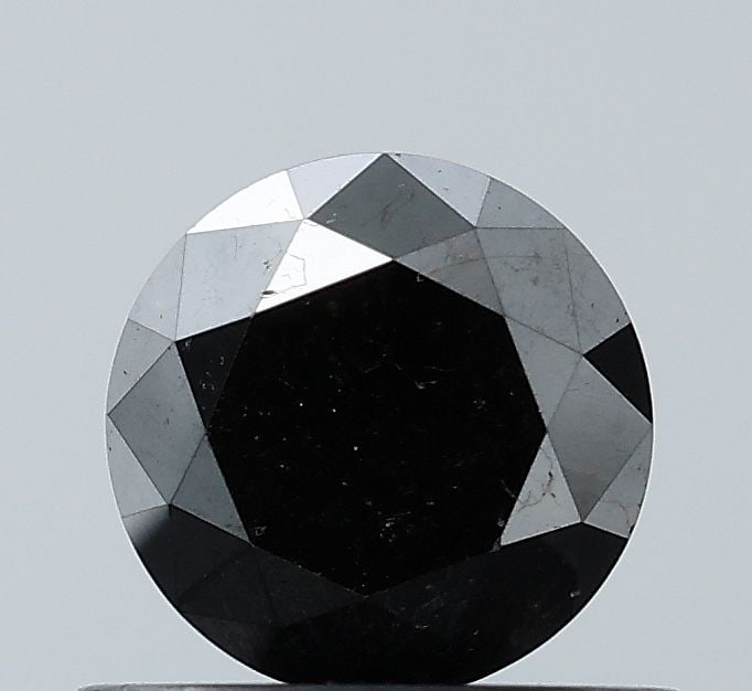 Loose Diamond - ROUND 0.79ct Fancy Black VS1: Loose Diamond - ROUND 0.79ct Fancy Black VS1 Source: Natural Shape: ROUND Carats: 0.79 Color: Fancy Black Certification: NONE Video: