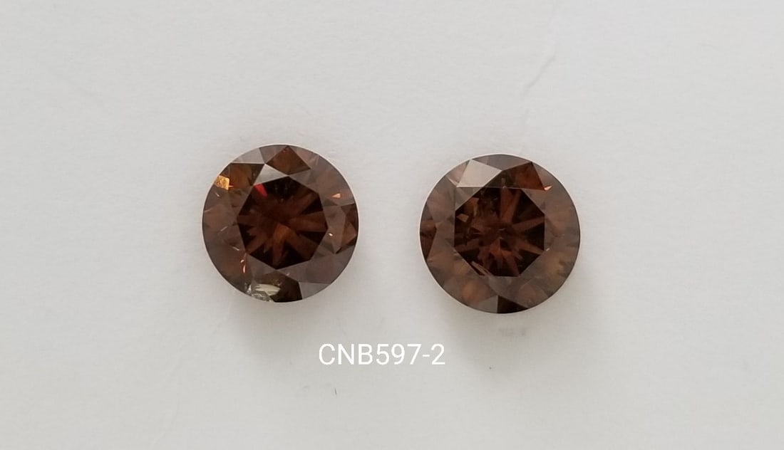 Loose Diamond - ROUND 2.04ct Fancy Intense Cognac SI2: Loose Diamond - ROUND 2.04ct Fancy Intense Cognac SI2 Source: Natural Shape: ROUND Carats: 2.04 Color: Fancy Intense Cognac Certification: NONE PLEASE NOTE: Framed, Large, or heavy items do not have s