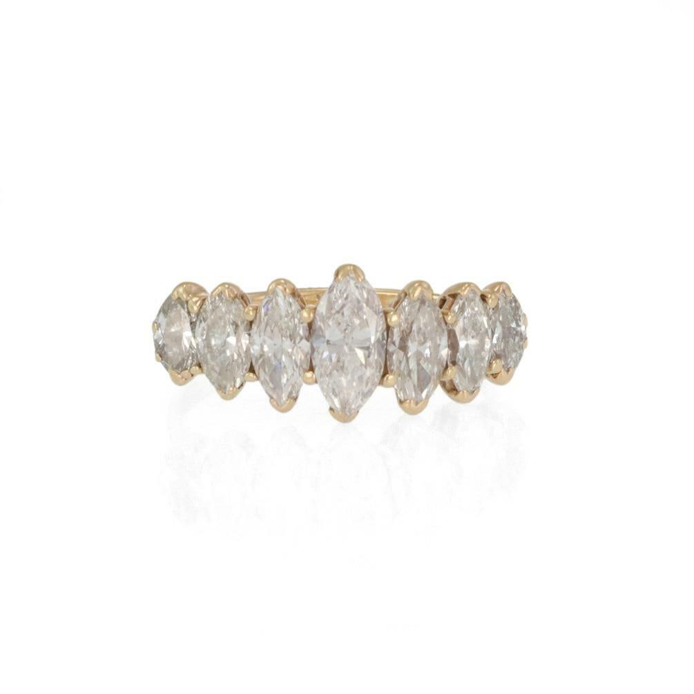 Stunning 2.70ct Marquise Diamond 14k Yellow Gold Band Ring: Stunning 2.70ct Marquise Diamond 14k Yellow Gold Band Ring This exquisite graduated diamond band ring is crafted from 14k yellow gold and showcases a stunning arrangement of 7 marquise cut diamonds. T