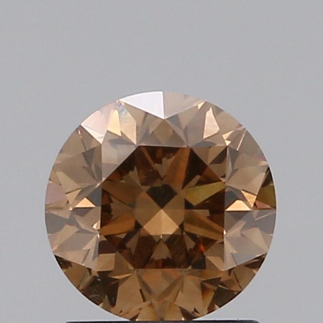 Loose Diamond - ROUND 1.23ct Fancy Orangey Brown VS2: Loose Diamond - ROUND 1.23ct Fancy Orangey Brown VS2 Source: Natural Shape: ROUND Carats: 1.23 Color: Fancy Orangey Brown Certification: GIA Video:
