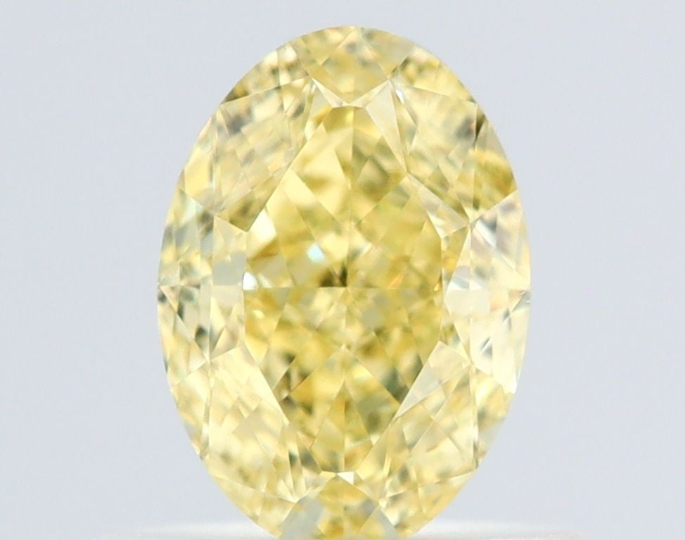 Loose Diamond - OVAL 0.71ct Fancy Yellow VS1: Loose Diamond - OVAL 0.71ct Fancy Yellow VS1 Source: Natural Shape: OVAL Carats: 0.71 Color: Fancy Yellow Certification: GIA Video:
