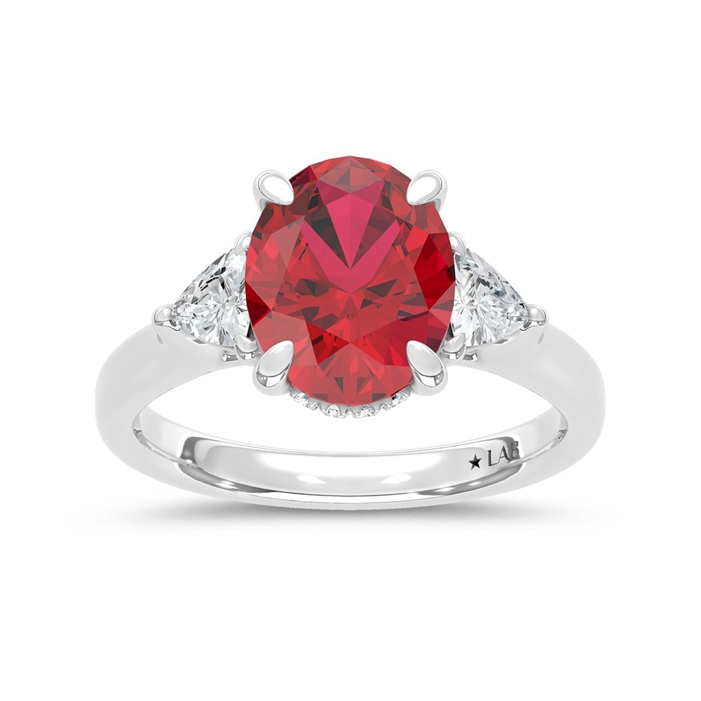 14K White Gold Lab Grown Diamond 4 1/5 Ct.Tw. Oval Shape Recrystalized Ruby Engagement Ring (Center: 14K White Gold Lab Grown Diamond 4 1/5 Ct.Tw. Oval Shape Recrystalized Ruby Engagement Ring (Center 3 5/8 ct) Exude elegance with this 14K white gold engagement ring. Its centerpiece is a stunning 3 5