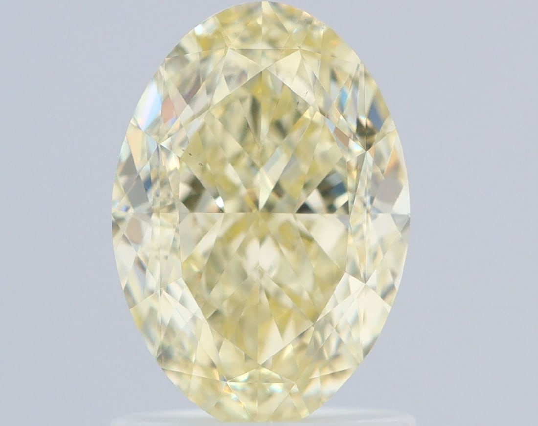 Loose Diamond - OVAL 1.5ct Fancy Light Yellow VS2: Loose Diamond - OVAL 1.5ct Fancy Light Yellow VS2 Source: Natural Shape: OVAL Carats: 1.5 Color: Fancy Light Yellow Certification: GIA Video: