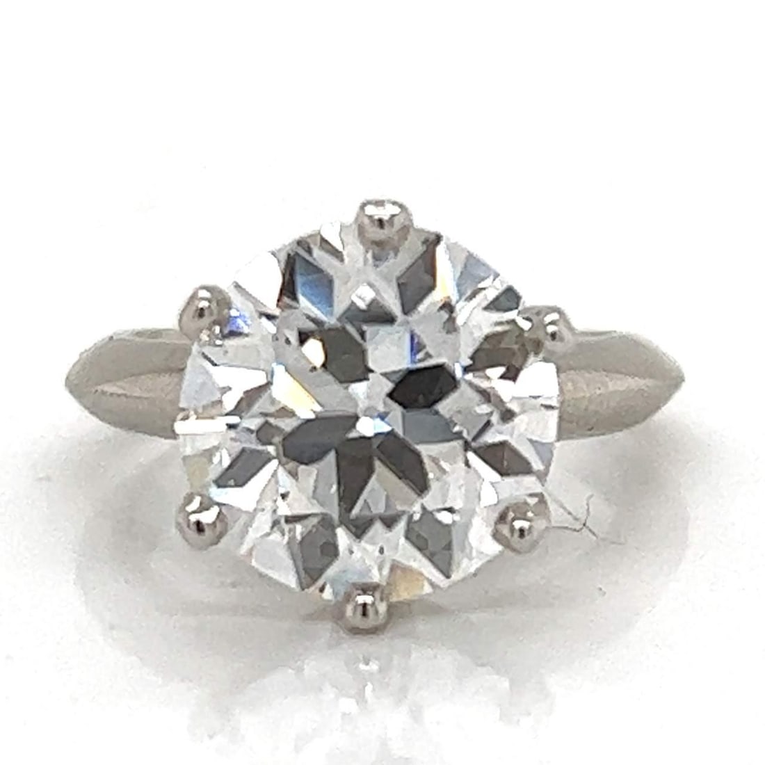 Tiffany & Co. Platinum Engagement Ring GIA Certified 4.87 Ct Diamond E VS2: Tiffany & Co. Platinum Engagement Ring GIA Certified 4.87 Ct Diamond E VS2 This exquisite engagement ring from Tiffany & Co. features a stunning GIA Certified 4.87 Ct. circular brilliant diamond, show
