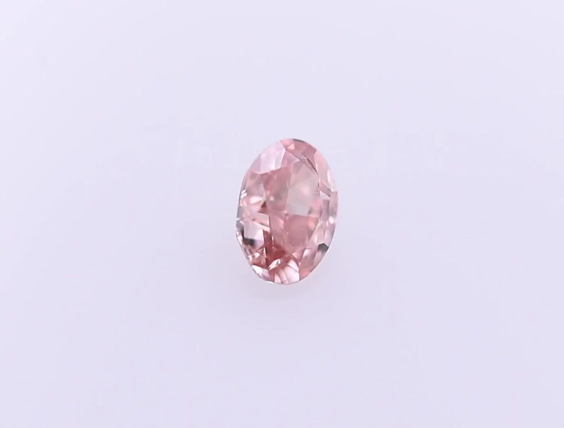Loose Diamond - OVAL 0.16ct Fancy Orangey Pink SI2: Loose Diamond - OVAL 0.16ct Fancy Orangey Pink SI2 Source: Natural Shape: OVAL Carats: 0.16 Color: Fancy Orangey Pink Certification: GIA Video: