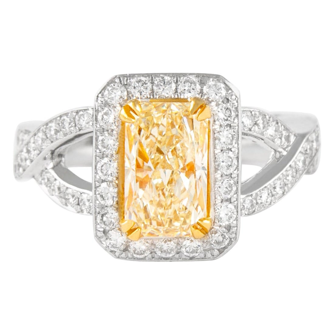 2.30ct Fancy Yellow Diamond Ring 18k EGL Certified: 2.30ct Fancy Yellow Diamond Ring 18k EGL Certified This exquisite 2.30ctt Fancy Yellow VS1 Radiant Diamond Ring showcases a stunning EGL certified yellow diamond. The ring features a contemporary desi