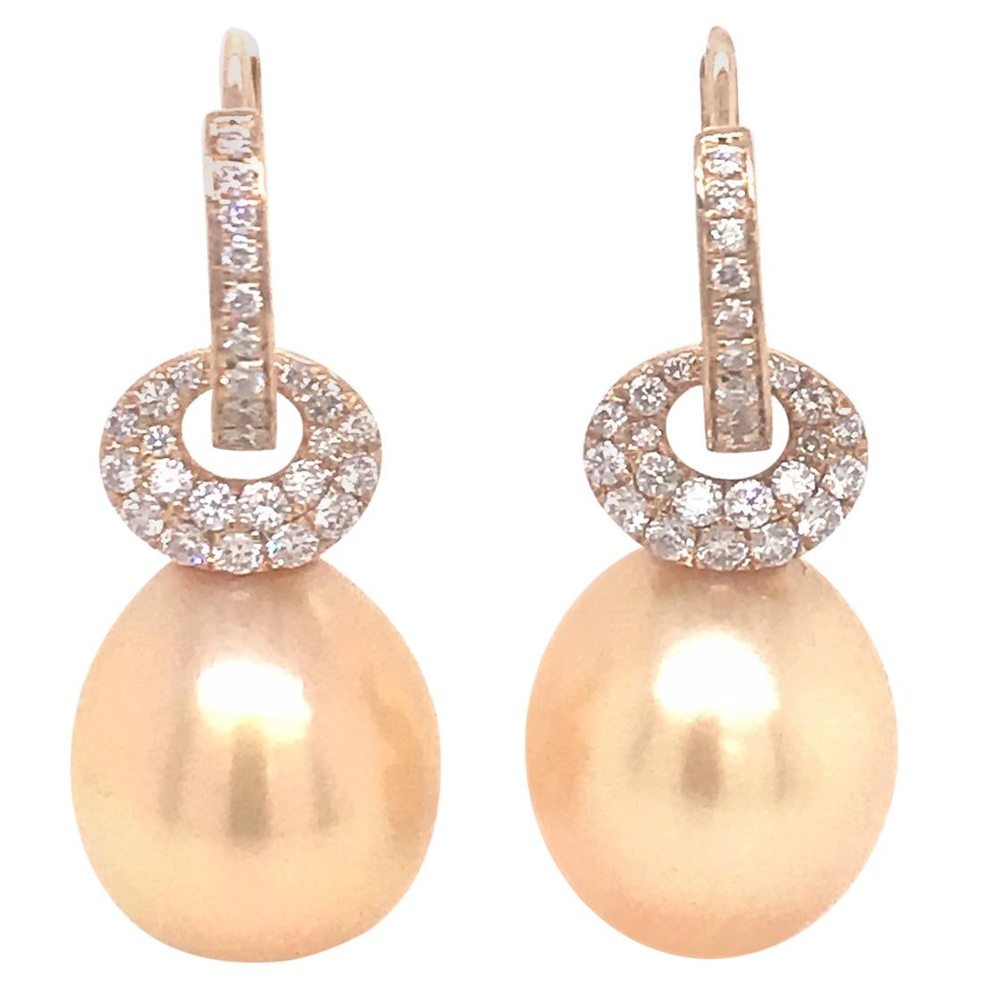 Harbor Diamonds 18K Yellow Gold South Sea Pearl Diamond Earrings 0.57 ct: Harbor Diamonds 18K Yellow Gold South Sea Pearl Diamond Earrings 0.57 ct Elevate your style with these exquisite drop earrings, crafted from 18K yellow gold and featuring stunning Golden South Sea pea