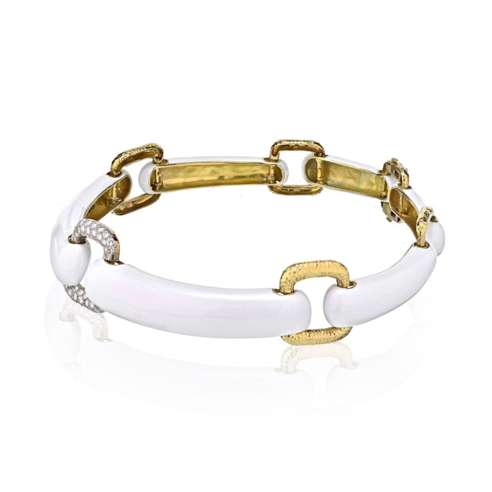 David Webb 18K Gold White Enamel Diamond Collar Necklace: David Webb 18K Gold White Enamel Diamond Collar Necklace This striking David Webb collar necklace is crafted from 18K yellow gold and features elegant white enamel accents. The design showcases large