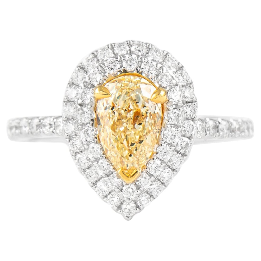 1.68ct Fancy Intense Yellow Pear Diamond Ring EGL Certified: 1.68ct Fancy Intense Yellow Pear Diamond Ring EGL Certified This exquisite 1.68ctt Fancy Intense Yellow Pear Diamond Ring showcases a stunning pear cut diamond weighing 1.06 carats, featuring a Fancy