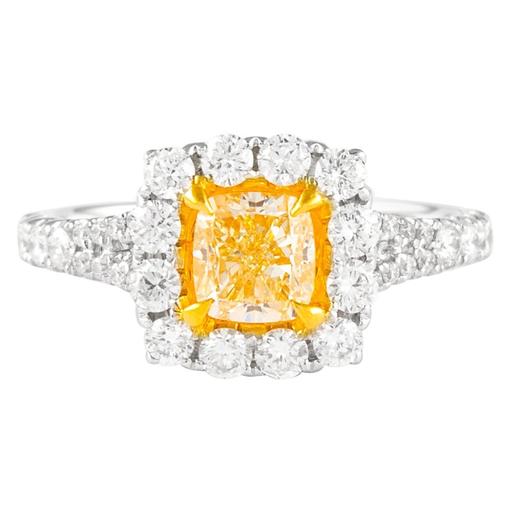 1.01ct Fancy Intense Yellow Diamond Halo Ring 18k Gold EGL Certified: 1.01ct Fancy Intense Yellow Diamond Halo Ring 18k Gold EGL Certified This exquisite ring features a stunning 1.01 carat cushion cut Fancy Intense Yellow diamond with VS1 clarity, beautifully set in a