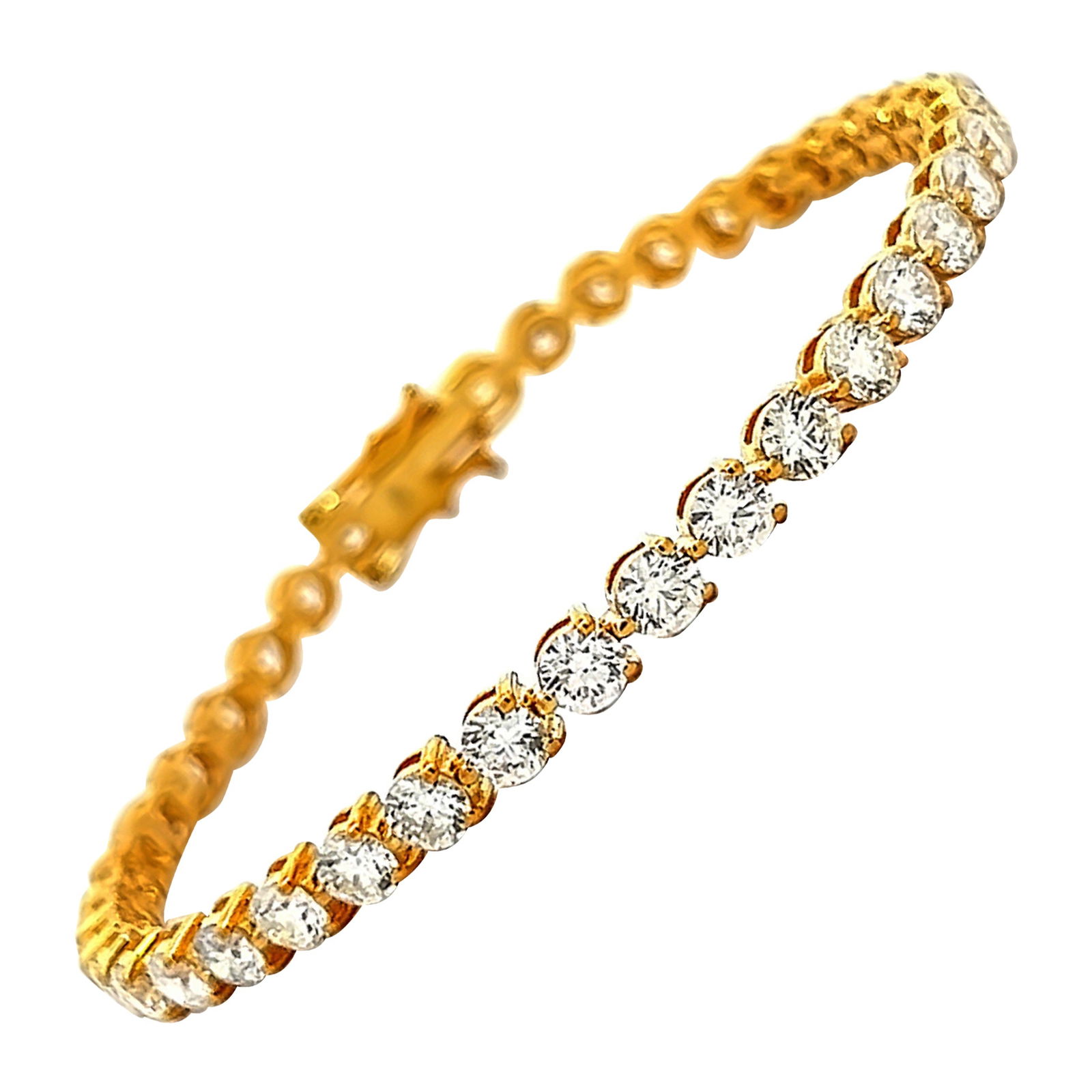 8.25ct Diamond Tennis Bracelet in 14k Yellow Gold: 8.25ct Diamond Tennis Bracelet in 14k Yellow Gold This exquisite 3-prong tennis bracelet features a stunning arrangement of 40 round brilliant diamonds totaling 8.25 carats. Crafted from 14k yellow go