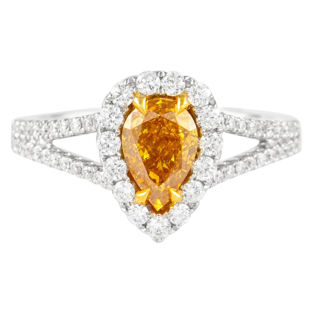 1.05ct Fancy Deep Orange-Yellow Diamond Ring GIA Certified: 1.05ct Fancy Deep Orange-Yellow Diamond Ring GIA Certified This exquisite GIA certified ring features a stunning 1.05 carat Fancy Deep Orange-Yellow pear cut diamond, graded by GIA. The ring is crafte