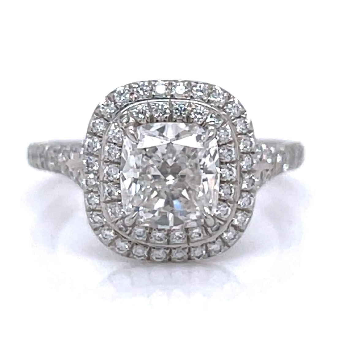 Tiffany & Co. Certified 1.26 Ct. Cushion-cut Diamond Ring with Box and Certificate: Tiffany & Co. Certified 1.26 Ct. Cushion-cut Diamond Ring with Box and Certificate This exquisite Tiffany & Co. certified diamond ring features a stunning 1.26 Ct. cushion-cut diamond with F color and