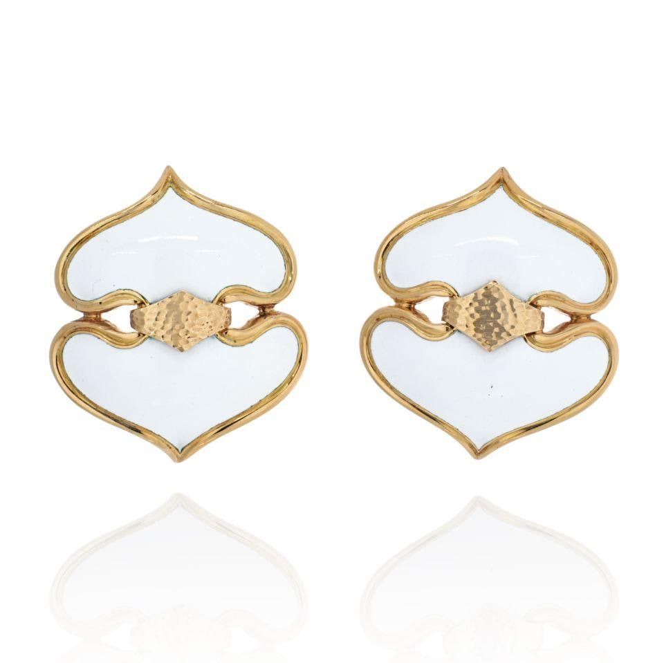 David Webb 18K Yellow Gold White Enamel Clip-On Onion Dome Earrings: David Webb 18K Yellow Gold White Enamel Clip-On Onion Dome Earrings These stunning earrings feature a unique upside-down Onion Dome design, crafted from luxurious 18K yellow gold and adorned with whit