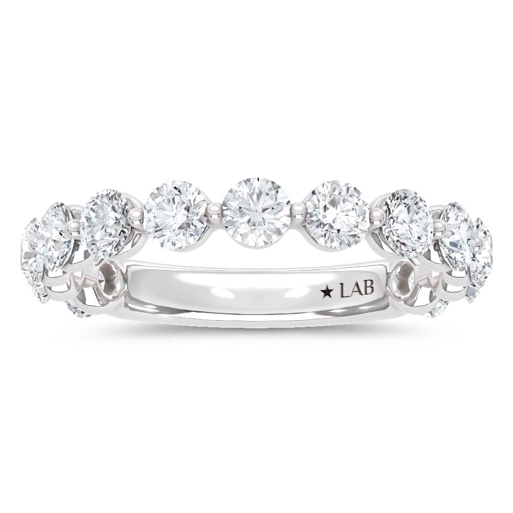 14K White Gold Lab Grown Diamond 1 1/2 Ct.Tw. Anniversary Band: 14K White Gold Lab Grown Diamond 1 1/2 Ct.Tw. Anniversary Band This opulent 14K White Gold Anniversary Band, adorned with 1 1/2 Ct.Tw. of Lab Grown Diamonds, is a stunning expression of eternal love.