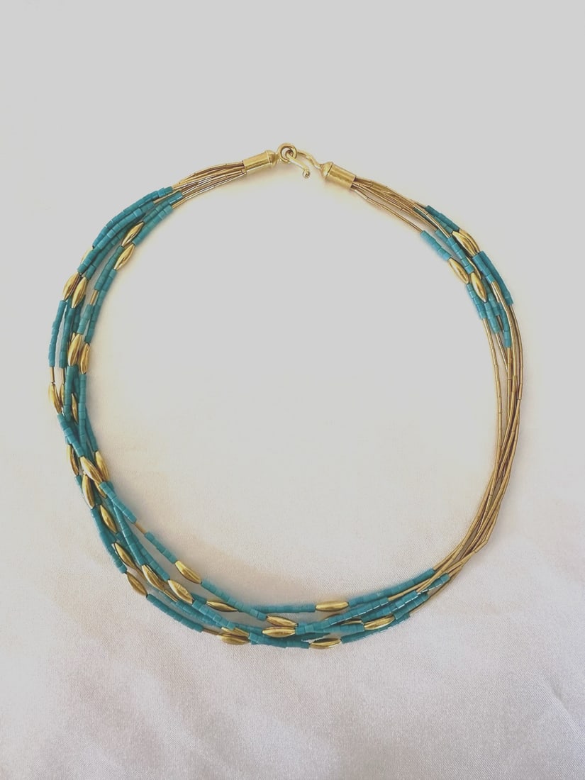 22-24k Yellow Gold Turquoise Necklace 38.20g Beaded Design: 22-24k Yellow Gold Turquoise Necklace 38.20g Beaded Design This exquisite high karat gold necklace features a stunning turquoise design, showcasing the beauty of topaz stones. Weighing 38.20 grams, th