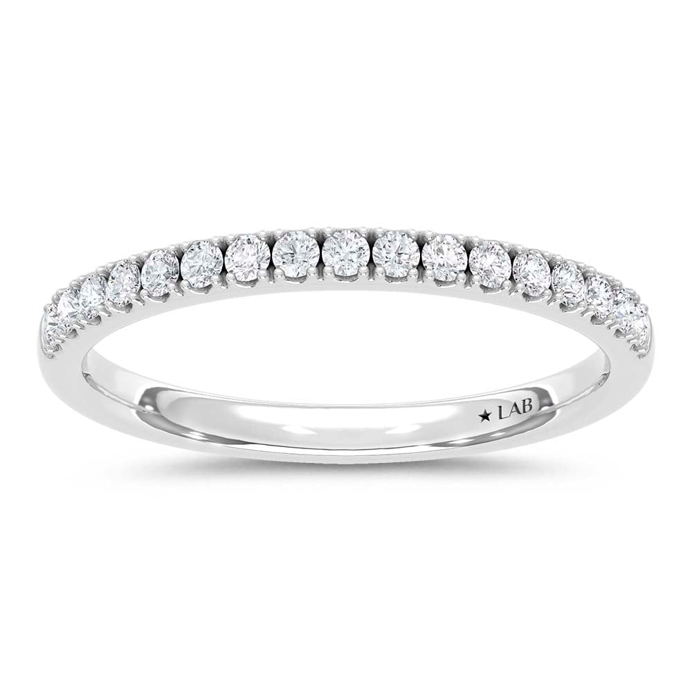 14K White Gold Lab Grown Round Diamond 1/4 Ct.Tw. Wedding Band: 14K White Gold Lab Grown Round Diamond 1/4 Ct.Tw. Wedding Band A refined and classic 14K White Gold Wedding Band, set with 1/4 Ct.Tw. of round Lab Grown Diamonds. The brilliance of the diamonds, set i