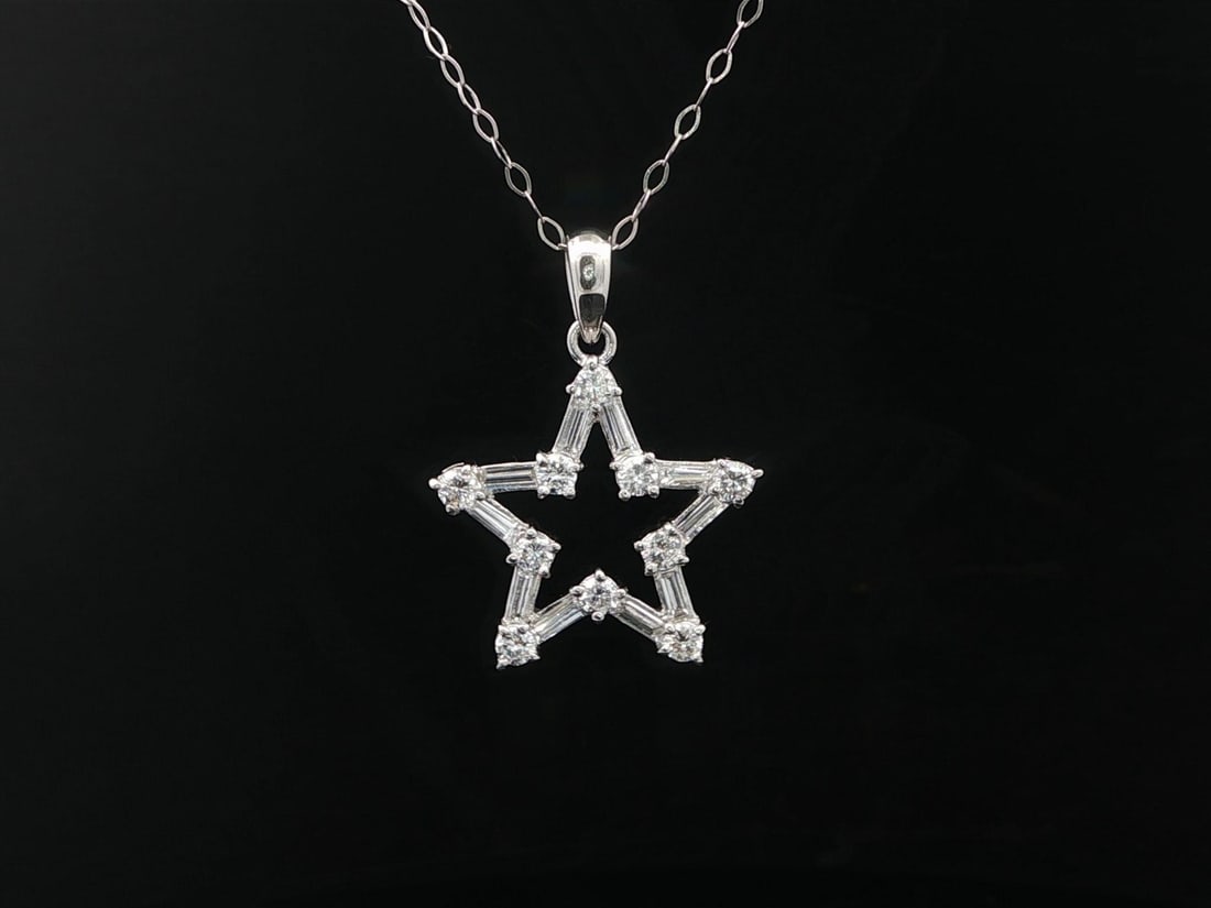 18 Inch Platinum Necklace with 0.75ctw Diamond Star Pendant: 18 Inch Platinum Necklace with 0.75ctw Diamond Star Pendant This elegant necklace features an open star pendant adorned with a total of 0.75 carats of natural, genuine diamonds, including 10 round bri