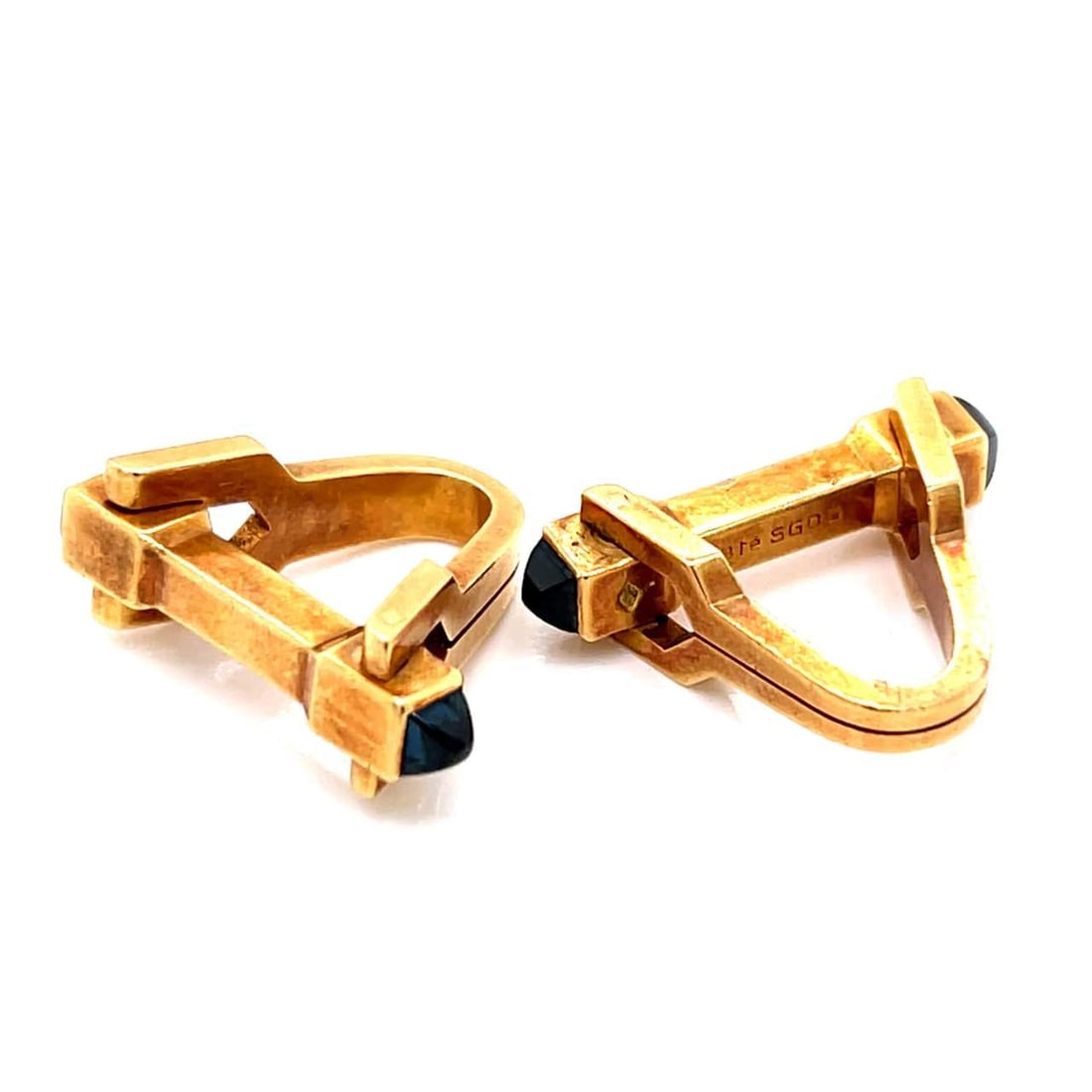 Elegant Art Deco 18K Gold Cufflinks with 4 Sapphires: Elegant Art Deco 18K Gold Cufflinks with 4 Sapphires These exquisite Art Deco cufflinks showcase a stunning design, crafted in 18K gold and adorned with four vibrant sapphires totaling approximately 1