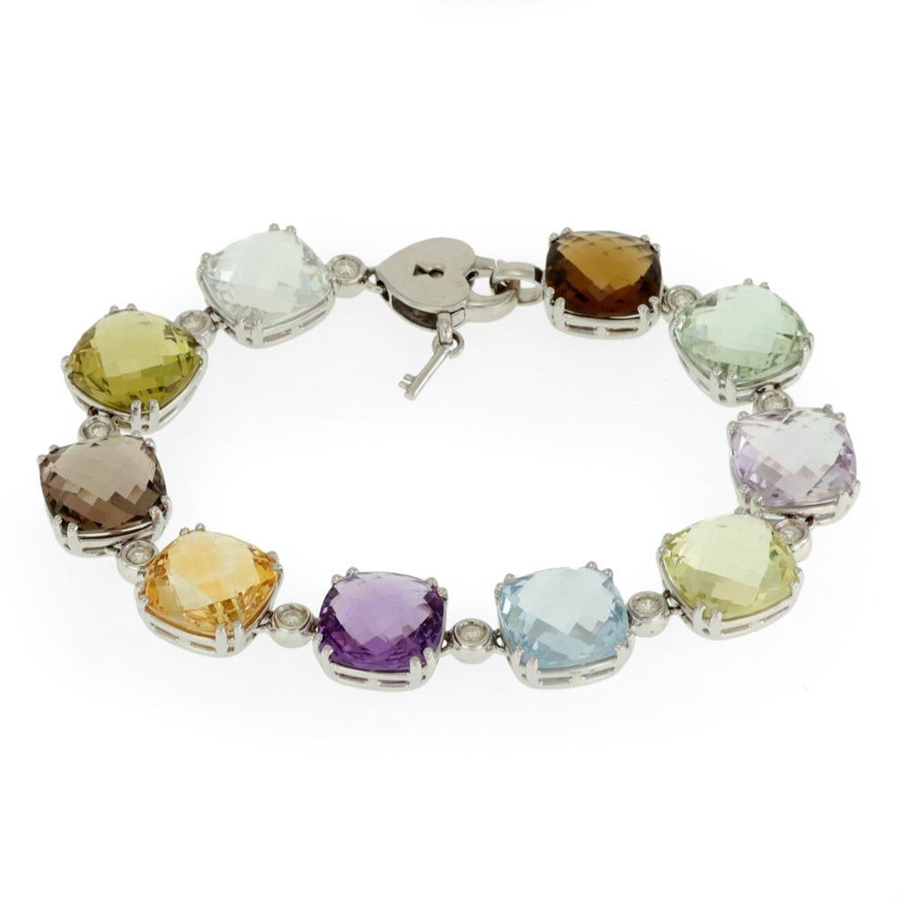 18k White Gold Multicolor Cushion Gemstone Bracelet with Diamonds: 18k White Gold Multicolor Cushion Gemstone Bracelet with Diamonds Elevate your jewelry collection with this exquisite Diamond Multicolor Gems Bracelet, meticulously crafted from 18k white gold. This s