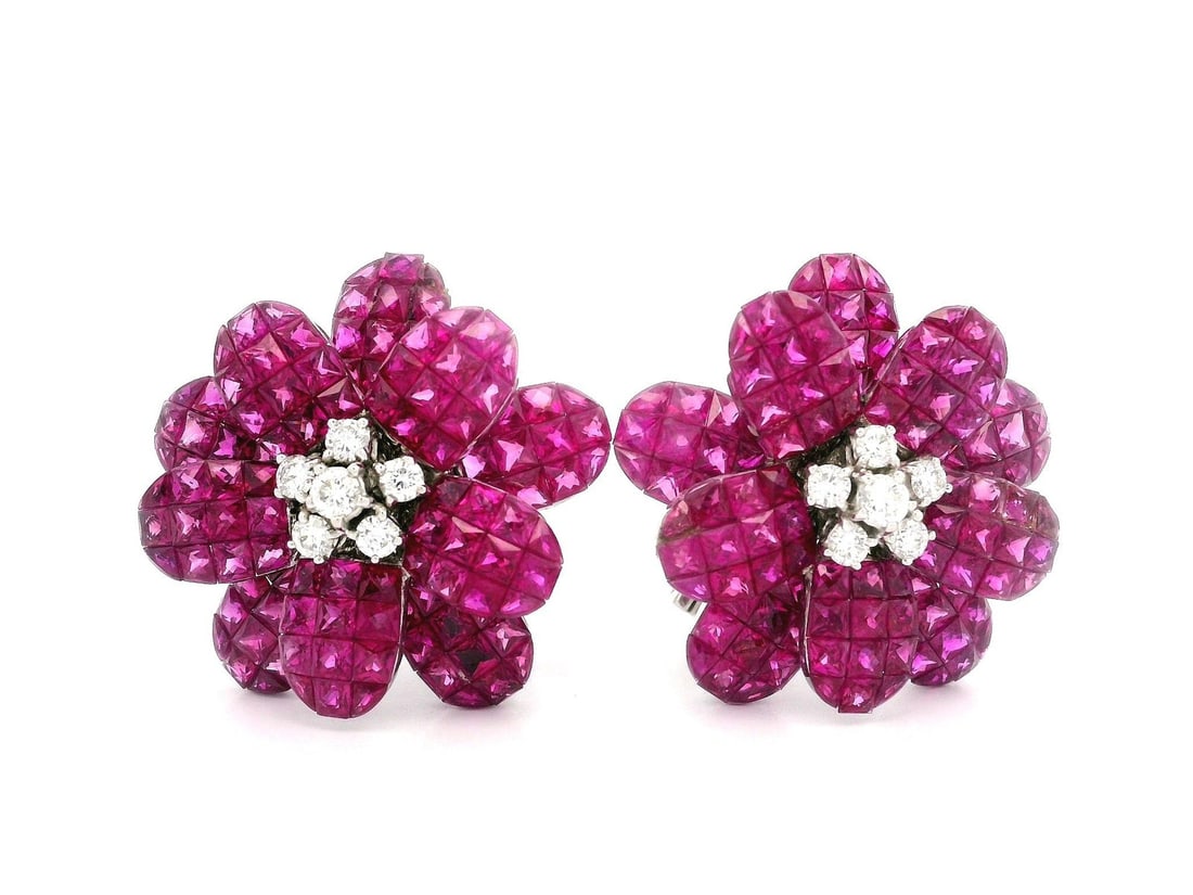 Elegant 18k White Gold Ruby Diamond Floral Clip On Earrings: Elegant 18k White Gold Ruby Diamond Floral Clip On Earrings Experience the elegance of these Gorgeous Gold Mystery Invisible Set Ruby & Diamond Floral Clip On Earrings. Crafted from solid 17-18k white