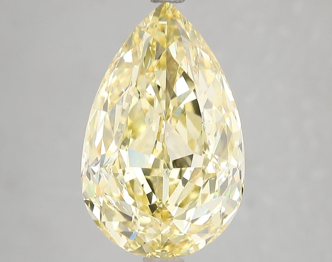 Loose Diamond - PEAR 7.01ct Fancy Vivid Yellow VS2: Loose Diamond - PEAR 7.01ct Fancy Vivid Yellow VS2 Source: This is a real non-mined Diamond that has been grown in a lab Shape: PEAR Carats: 7.01 Color: Fancy Vivid Yellow Certification: IGI Video: