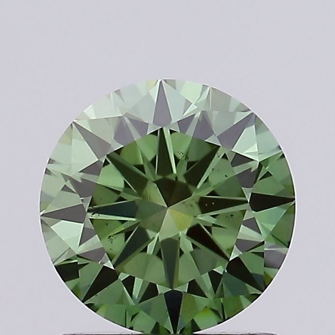 Loose Diamond - ROUND 1.02ct Fancy Vivid Green VS2: Loose Diamond - ROUND 1.02ct Fancy Vivid Green VS2 Source: This is a real non-mined Diamond that has been grown in a lab Shape: ROUND Carats: 1.02 Color: Fancy Vivid Green Certification: IGI Video: