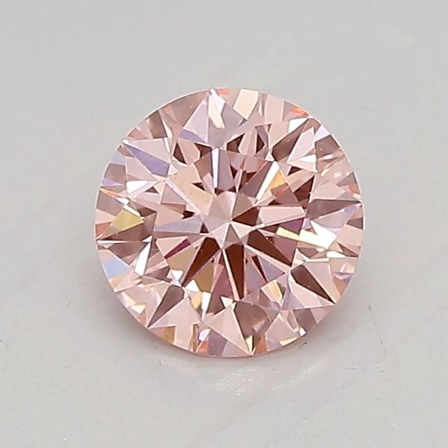 Loose Diamond - ROUND 0.61ct Fancy Intense Pink VS1: Loose Diamond - ROUND 0.61ct Fancy Intense Pink VS1 Source: This is a real non-mined Diamond that has been grown in a lab Shape: ROUND Carats: 0.61 Color: Fancy Intense Pink Certification: IGI Video: